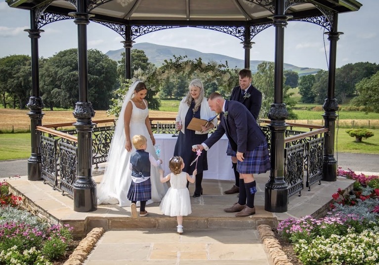 Yvonne Hannah, a humanist celebrant with Fuze Ceremonies, conducts a family wedding at Cornhill Castle