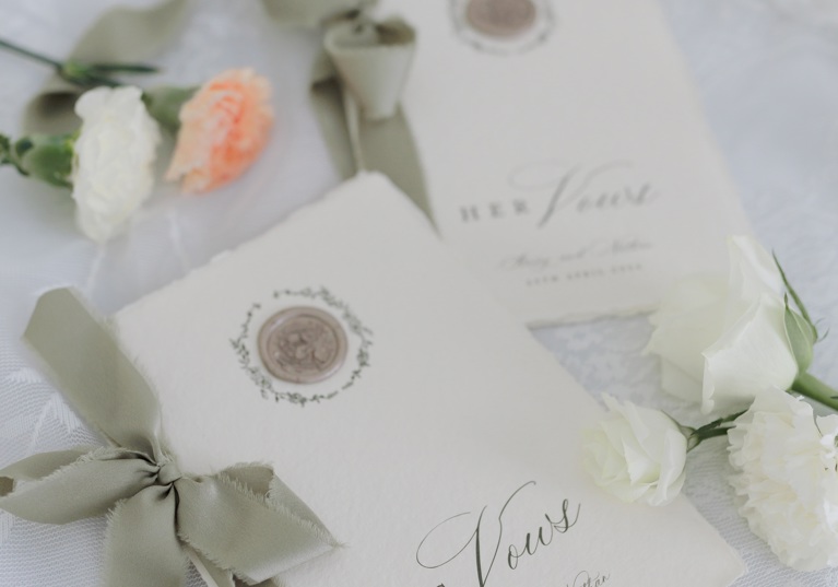 Handmade paper wedding vw books with gold wax seal and sage ribbon
