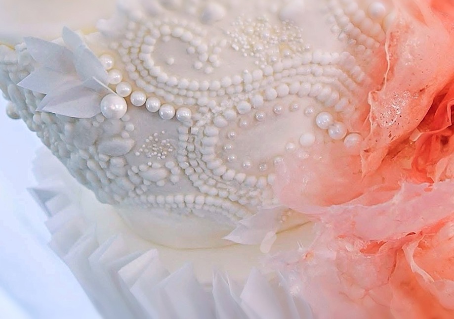 Luxury couture wedding cake inspired by a bridal gown, entirely handcrafted and fully edible in every artistic detail, created by Eclectic Luxuries – Artisan Couture Cakes.