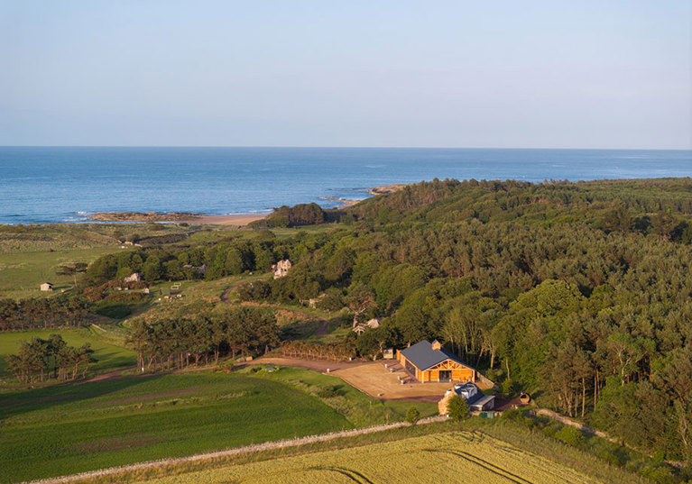 Harvest Moon weddings aerial view towards Tyninghame Beach