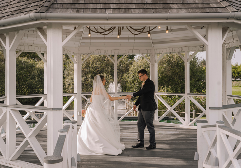 The Gailes Hotel & Spa bride and groom dancing in the outdoor wedding gazebo