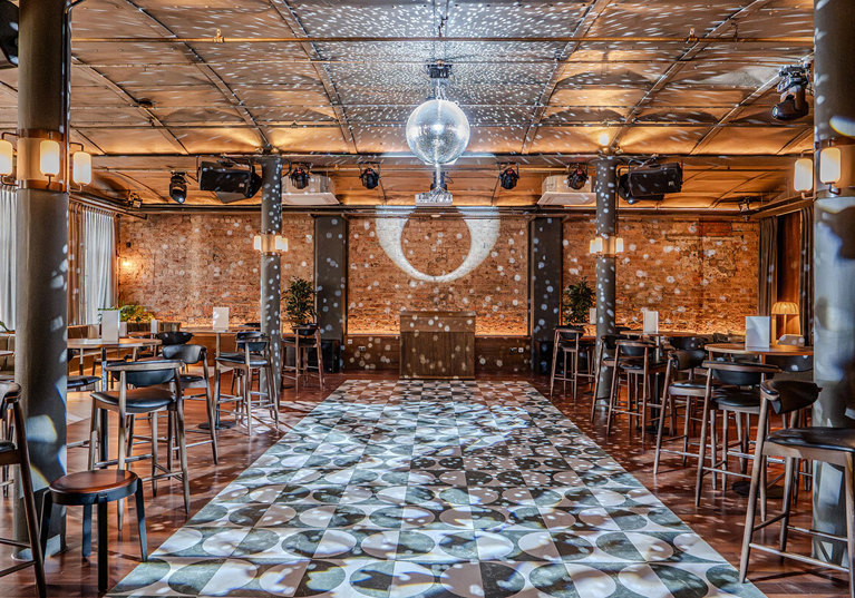 Reception with disco ball and lights in the Print Room at The Exchange in Glasgow.