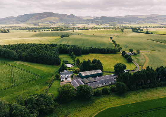 Drone view of Wed in a Shed in Perthshire with hills in background