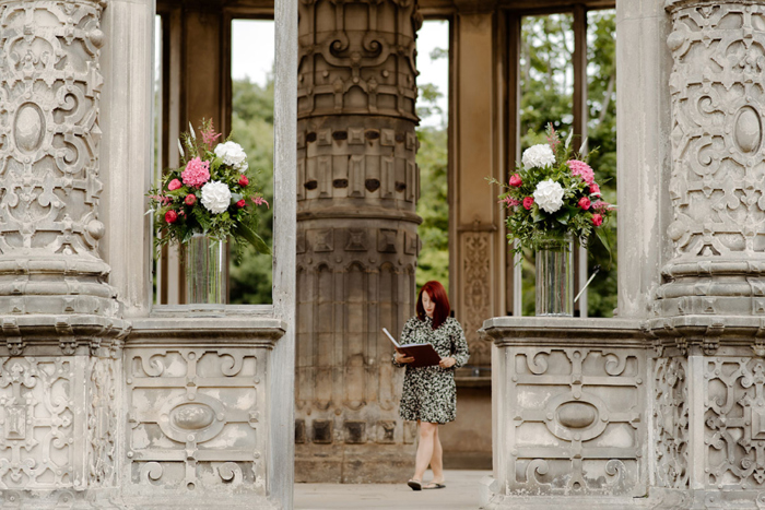 Celebrant waits outside in The Orangery before ceremony starts