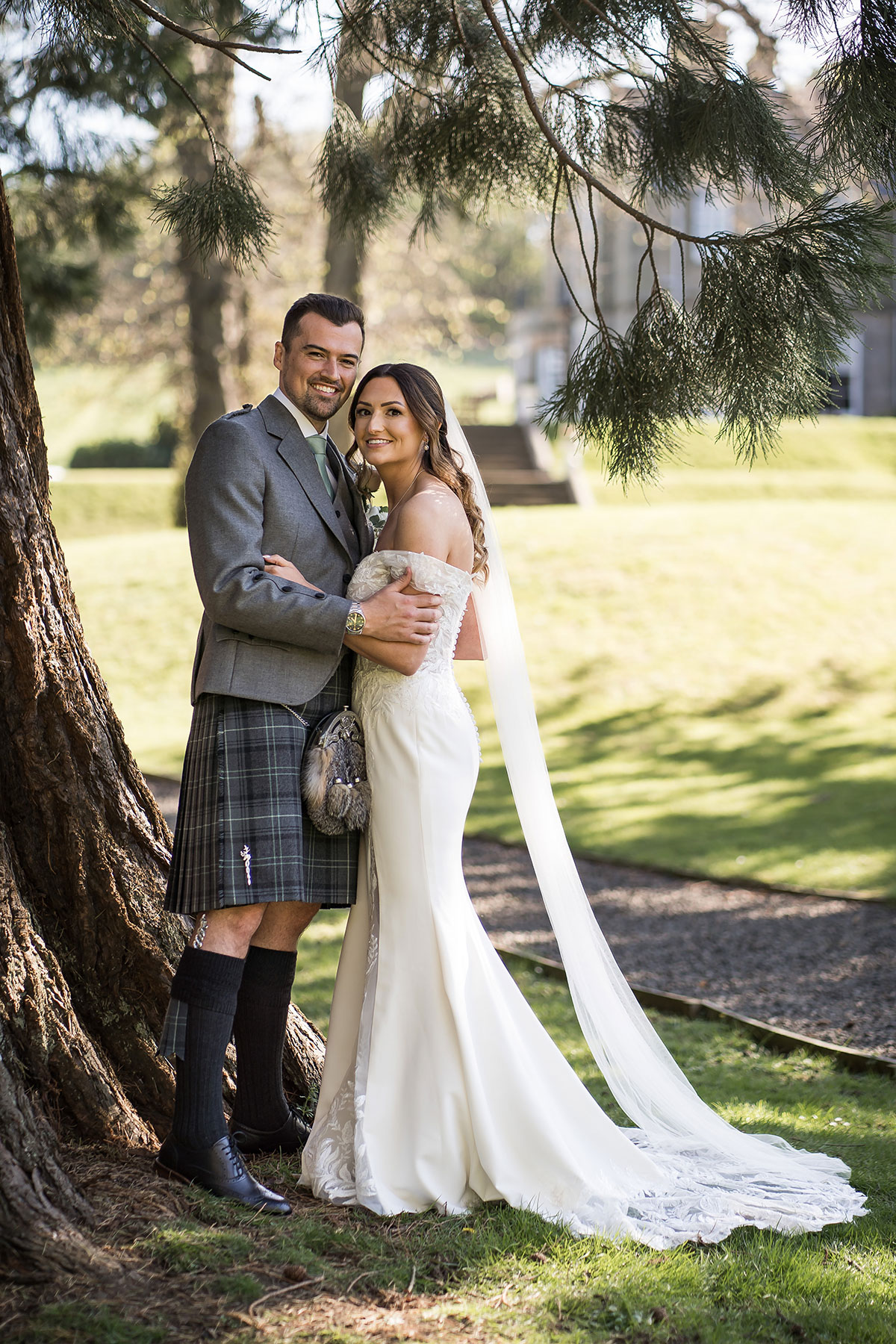 Bride and groom in the gardens at Norton House Hotel & Spa wedding venue near Edinburgh