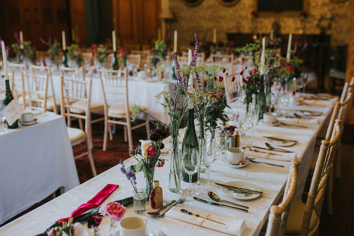 dinner set up with colourful flowers and cream linen at cambo house for a wedding
