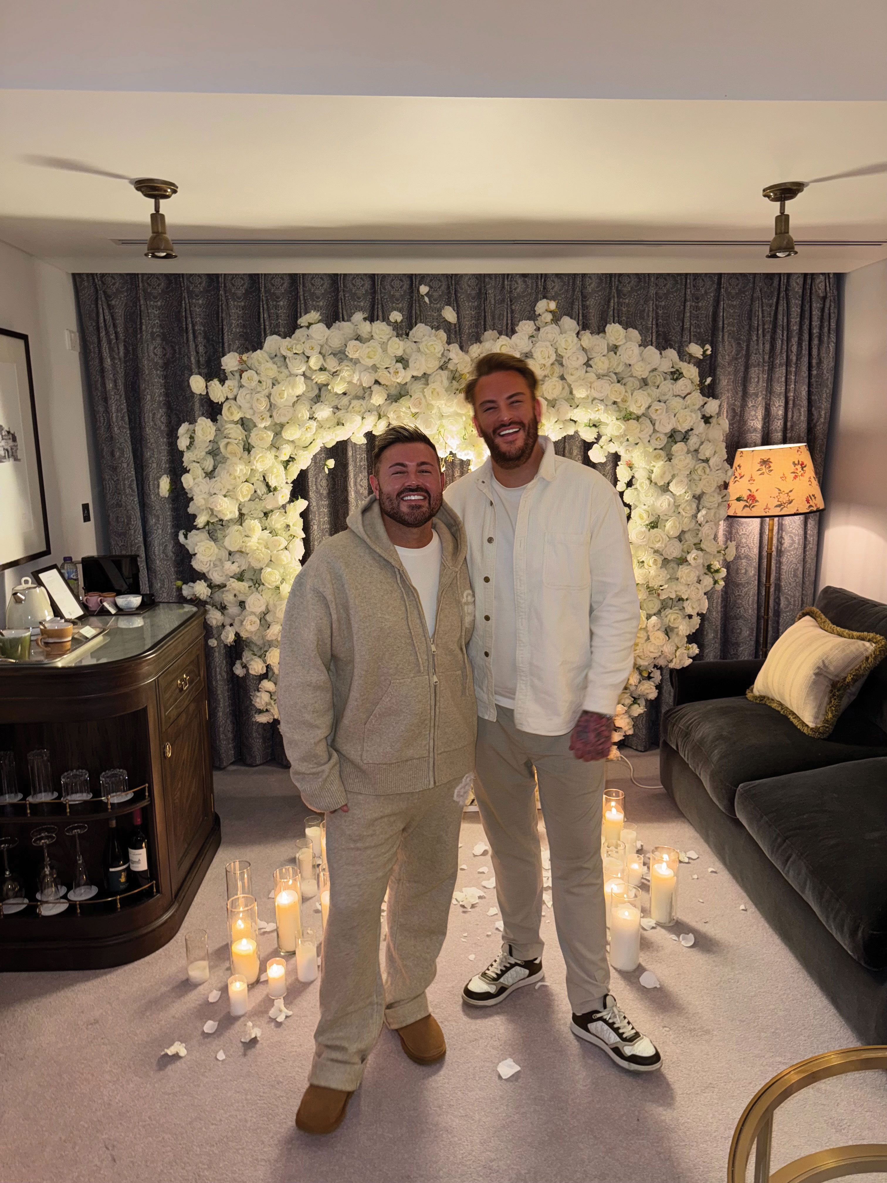 couple smile for photograph after getting engaged at gleneagles