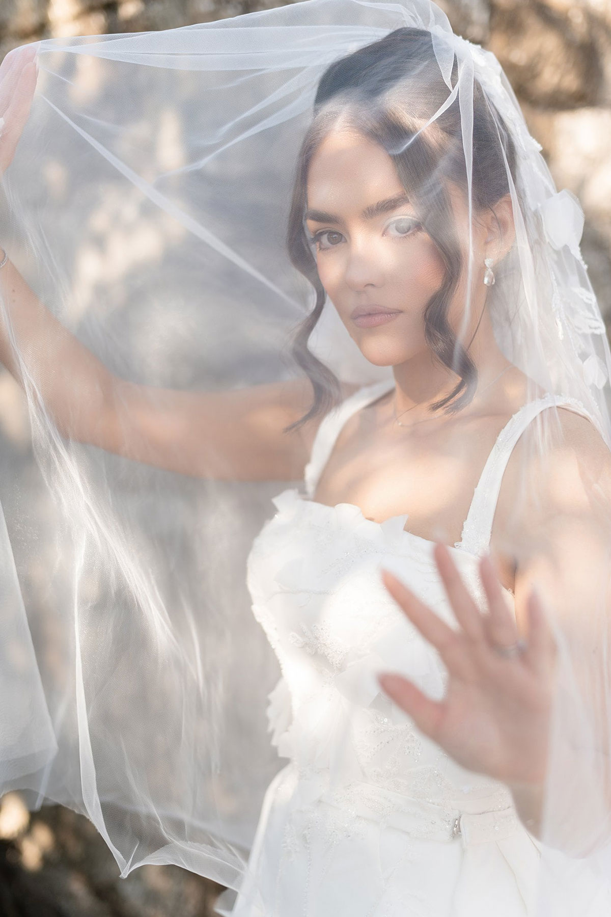 Artistic bridal portrait through veil during Old Course Hotel wedding photos in St Andrews.