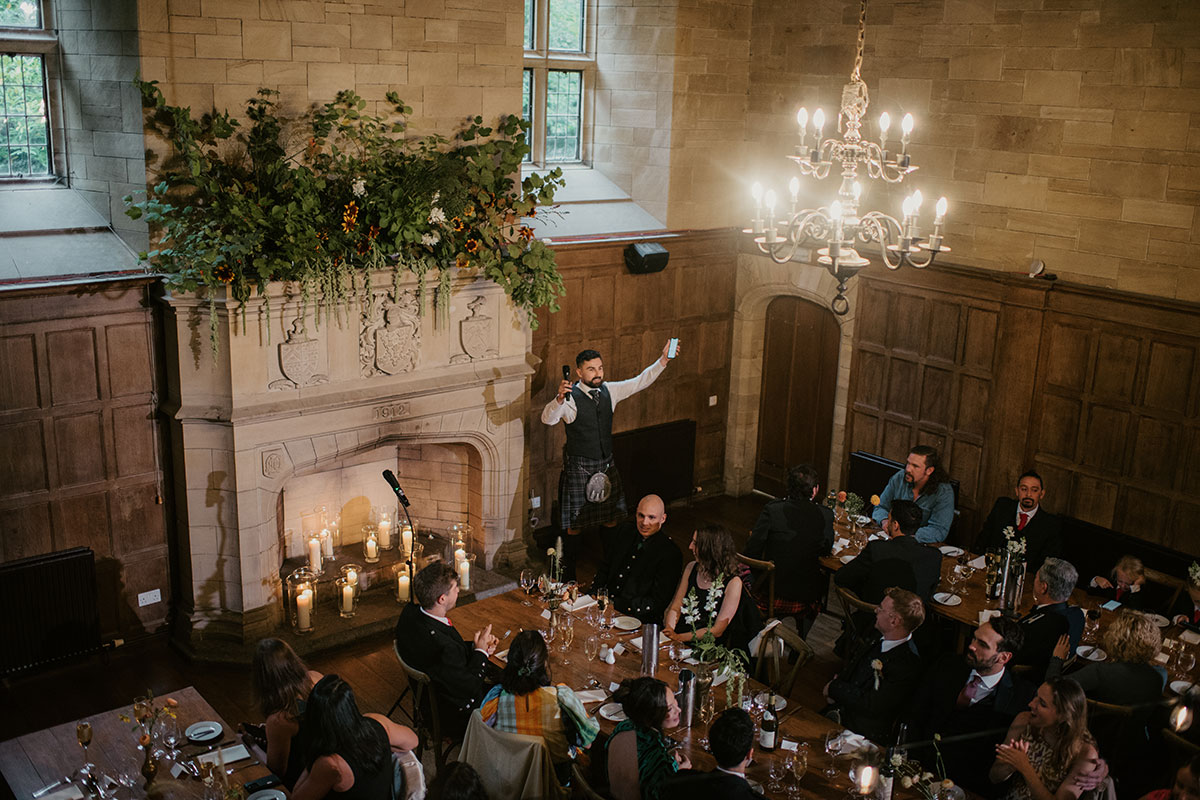 wedding speeches and seated guests in ballroom at Achnagairn Castle