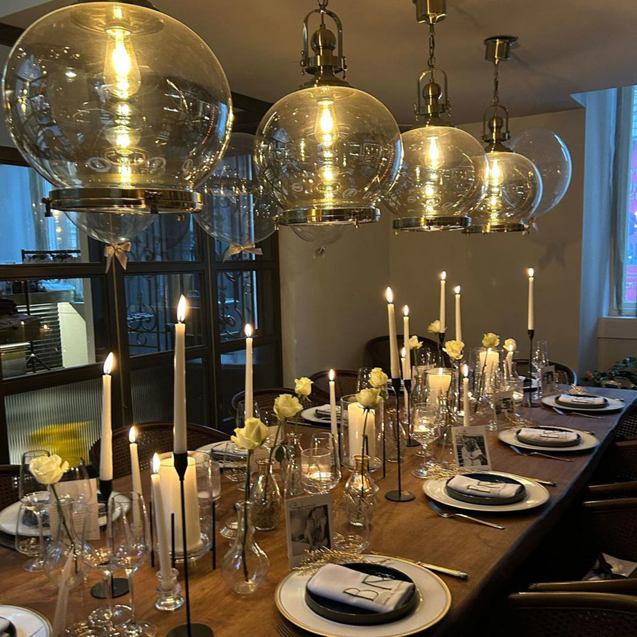 A table with candles and glasses at Banca Di Roma in Glasgow