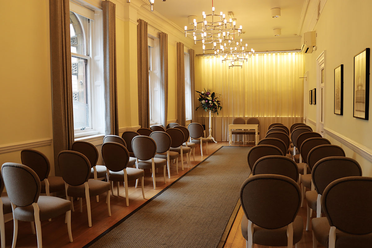Registry office wedding ceremony room in Scotland set with chairs for civil ceremony