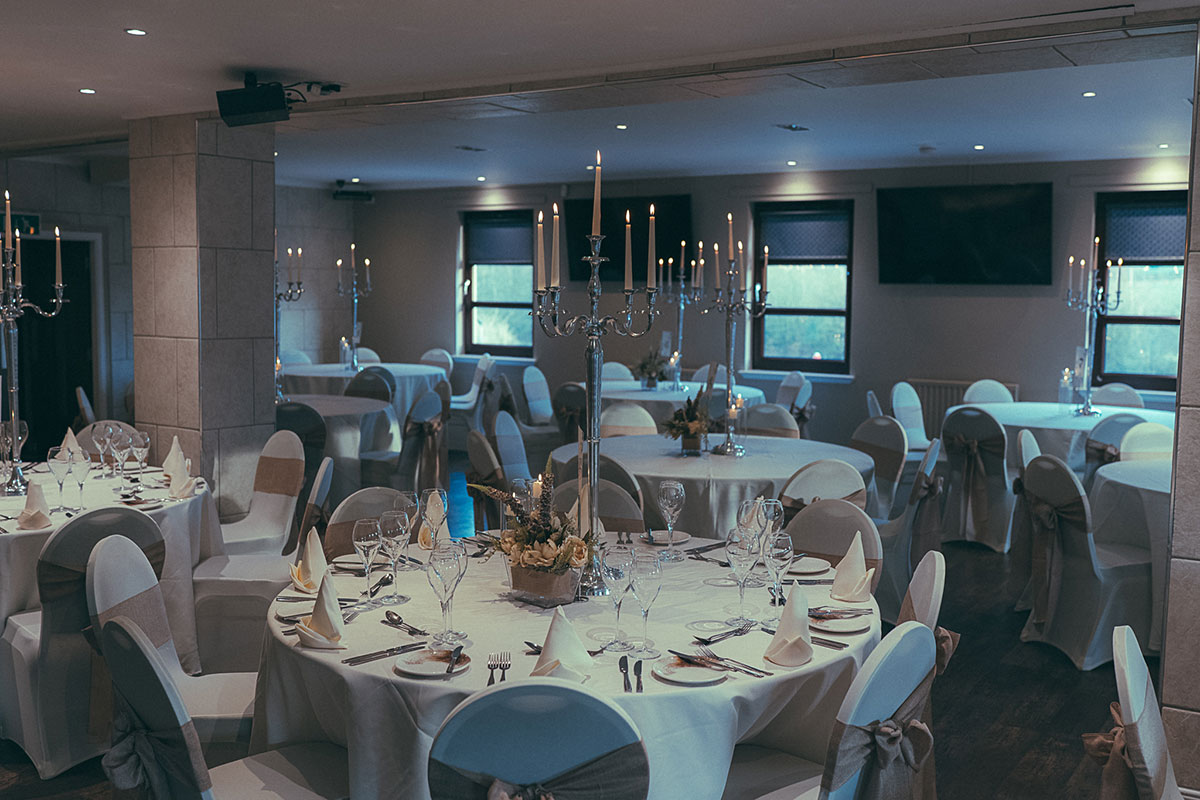 dinner set up with chairs and neutral fowers for a wedding ceremony at the river inn in glasgow