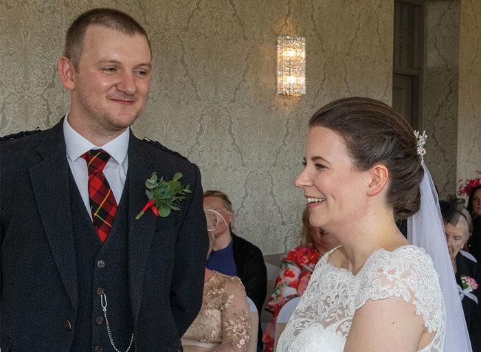 bride and groom looking at each other