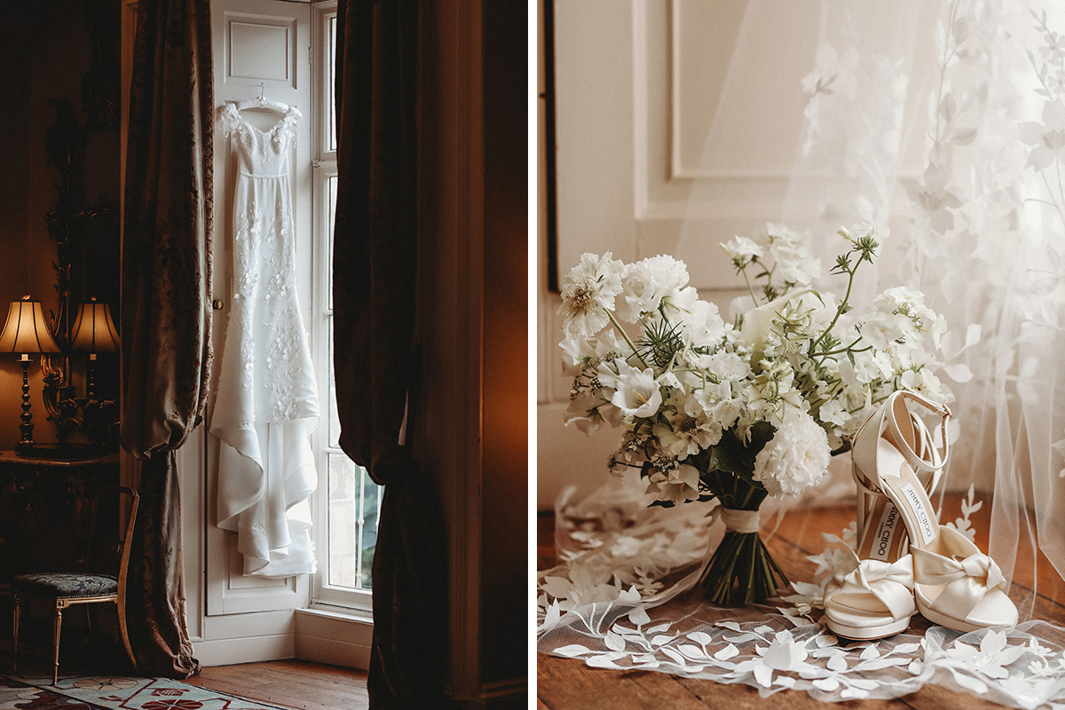 An Eleganza Sposa Wedding Dress Hanging In A Window And A White Wedding Bouquet And Ivory Wedding Shoes