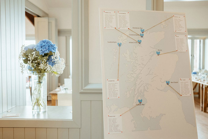 map of scotland used as table plan for guests during wedding at dougarie boathouse