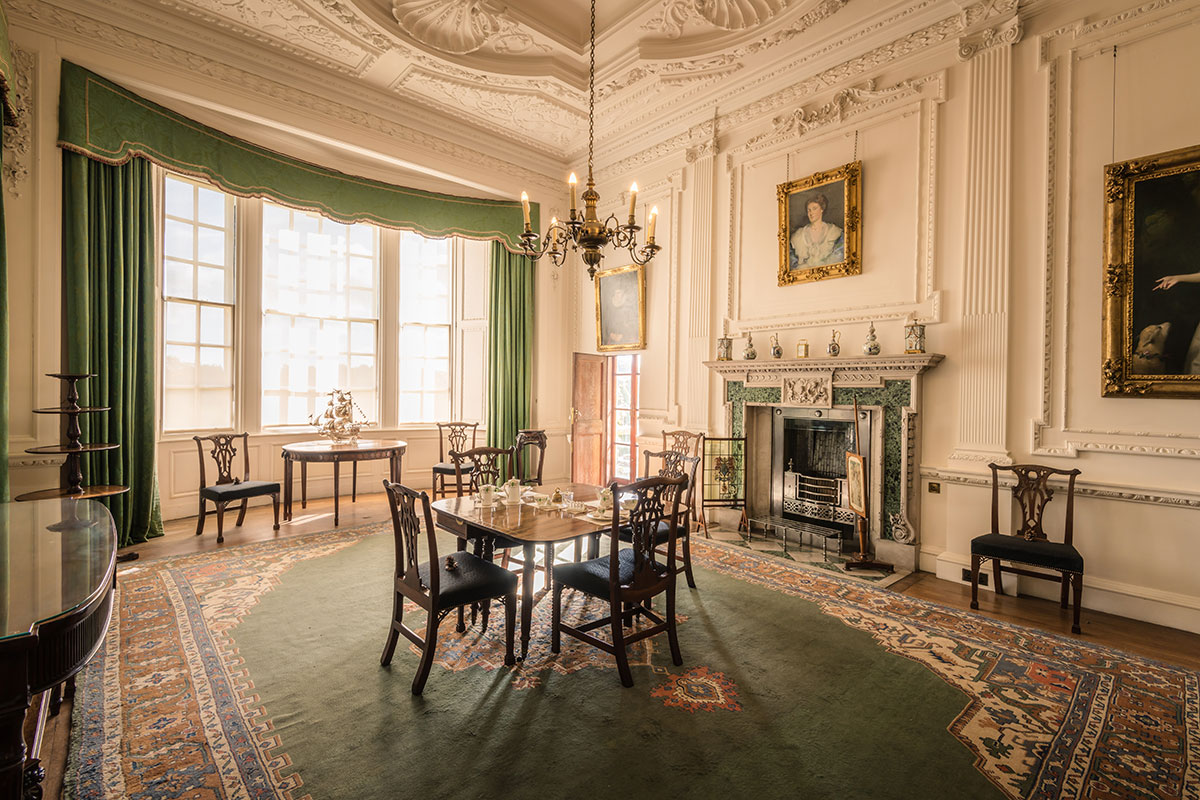 Hill of Tarvit interior drawing room with ornate ceiling, period fireplace, chandelier and antique furniture set for an elegant wedding setting