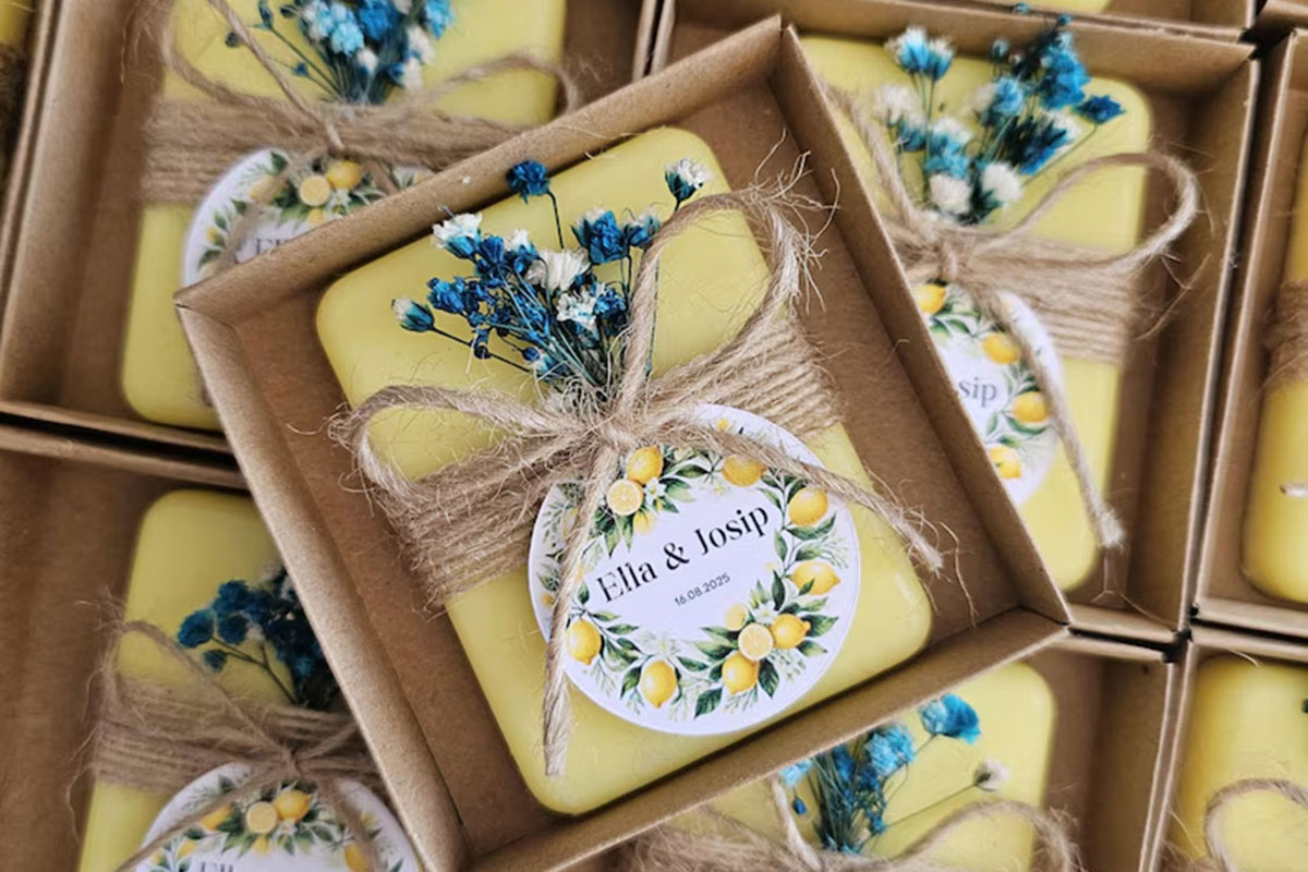 Lemon-themed soap wedding favours in kraft boxes with twine and dried flowers