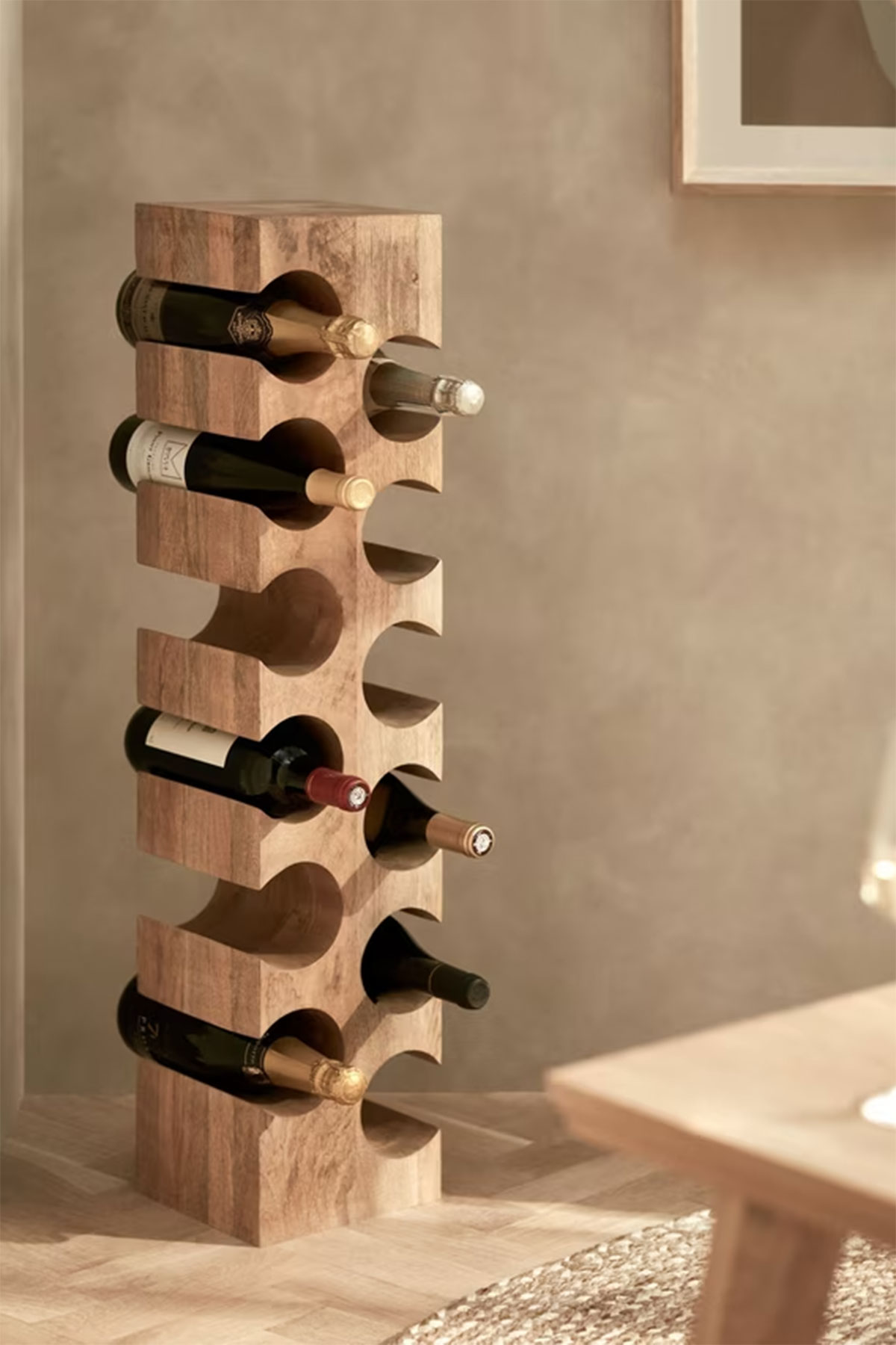 John Lewis mango wood wine rack holding bottles, a stylish homeware wedding gift for wine-loving couples