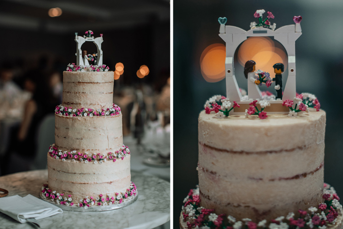 Couple's wedding cake featuring lego toppers