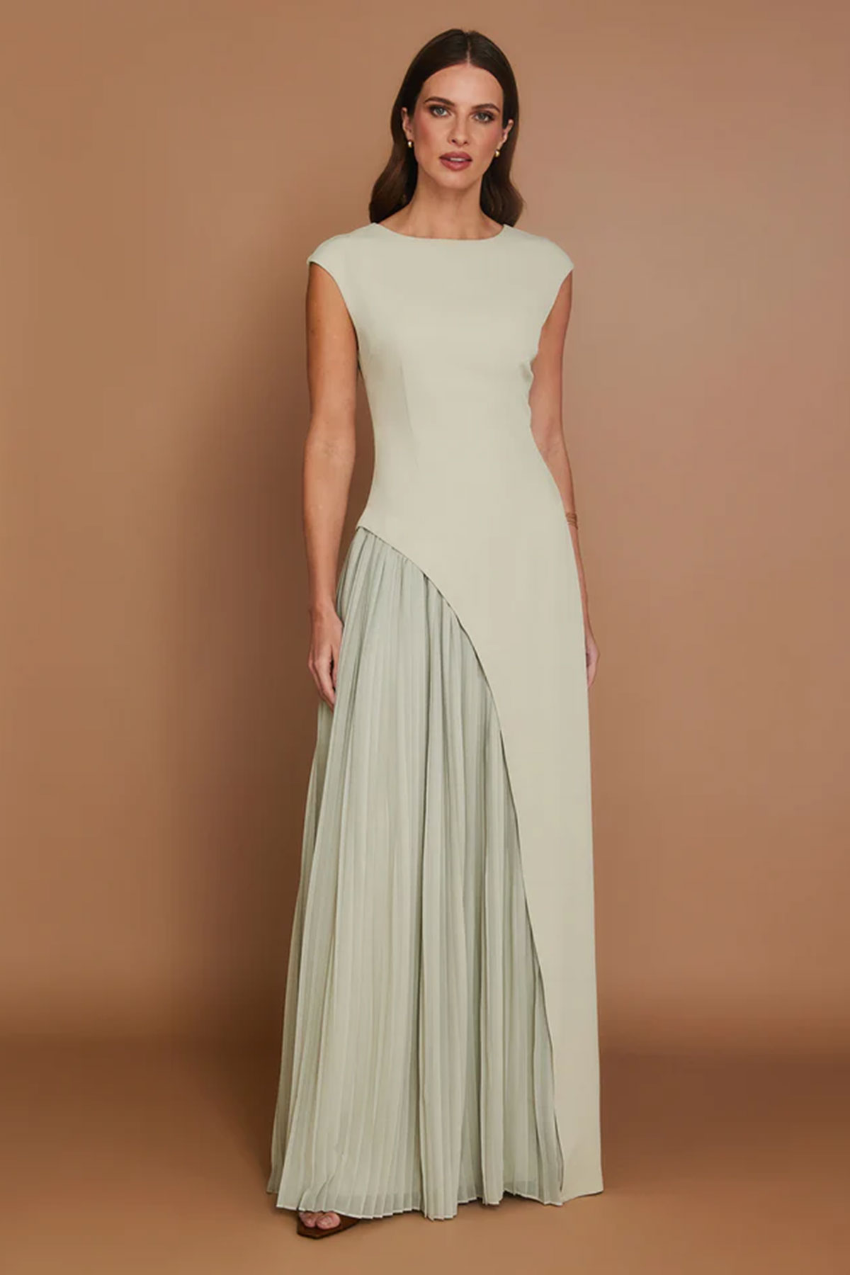 Pistachio green cap-sleeve maxi dress with pleated skirt and asymmetric seam
