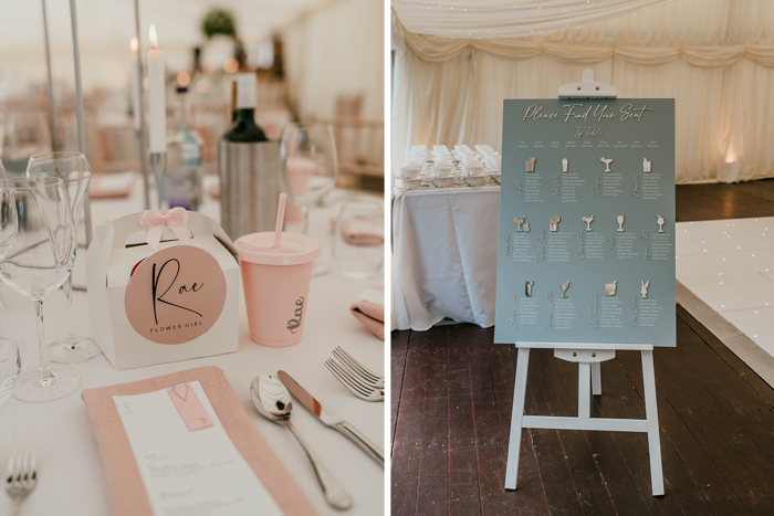 On the left a pink menu, name card and tumbler with a straw sit on a white tablecloth with cutlery and glasses, on the right a blue sign shows a cocktail-themed seating chart