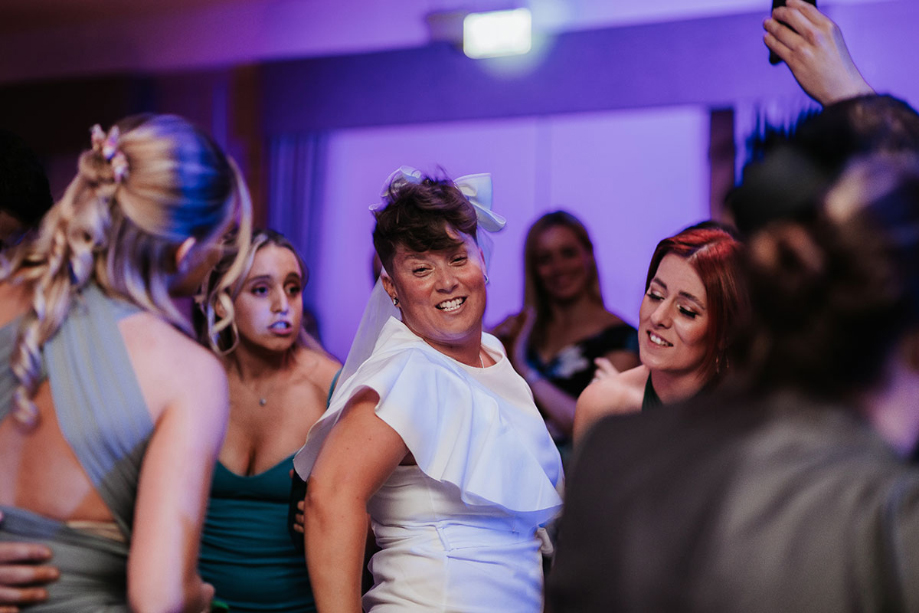 Bride has fun on the dancefloor