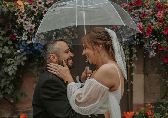Couple portrait under an umbrella 