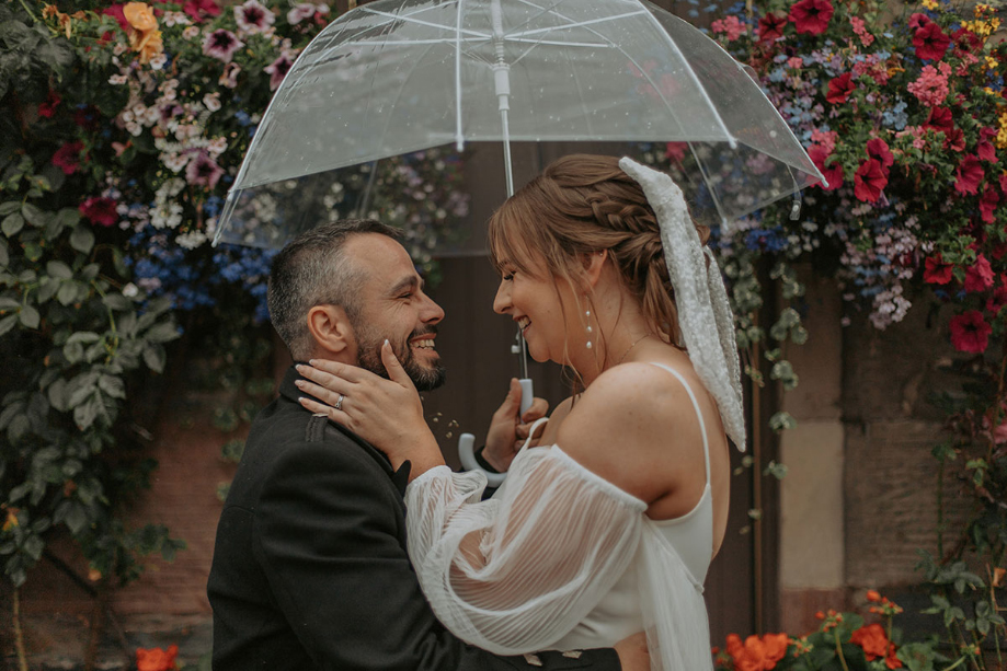 Couple portrait under an umbrella