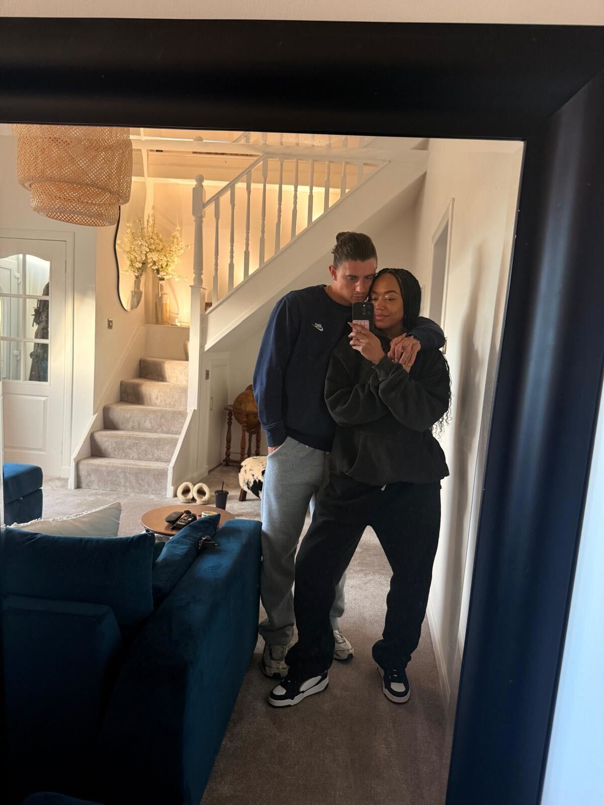 influencer maggie smith takes mirror selfie with boyfriend jordan lowden at home