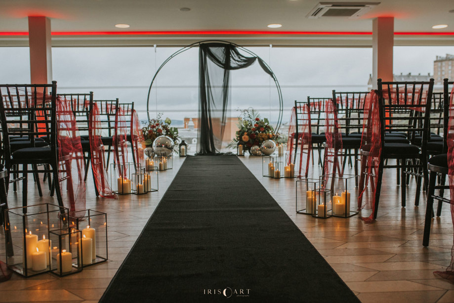 aisle set up with black carpet and chairs for wedding at Doubletree By Hilton Edinburgh Skybar