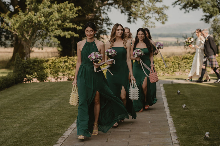 Bridesmaids Wearing Green Walking At Hartree Estates