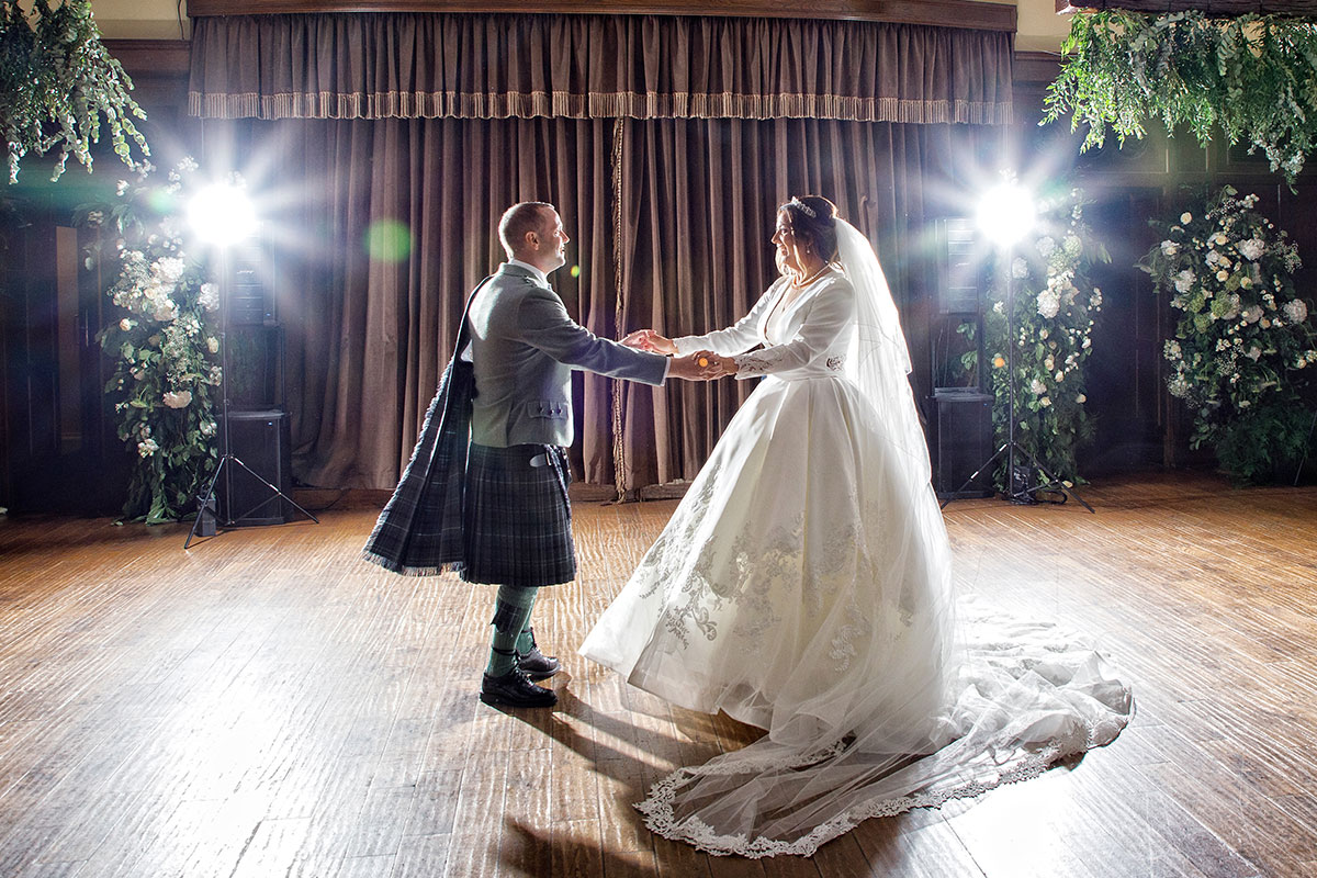 a bride and groom dancing