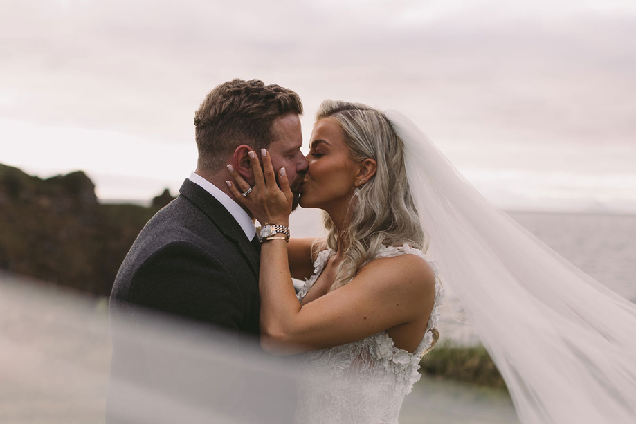 Bride and groom share a kiss