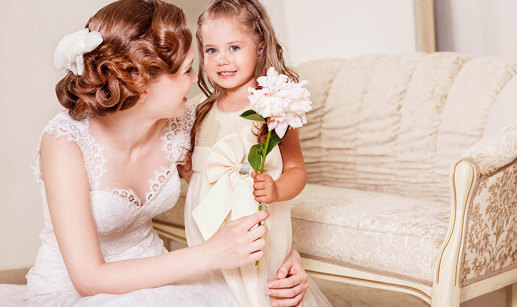 Bride At Wedding With Flower Girl
