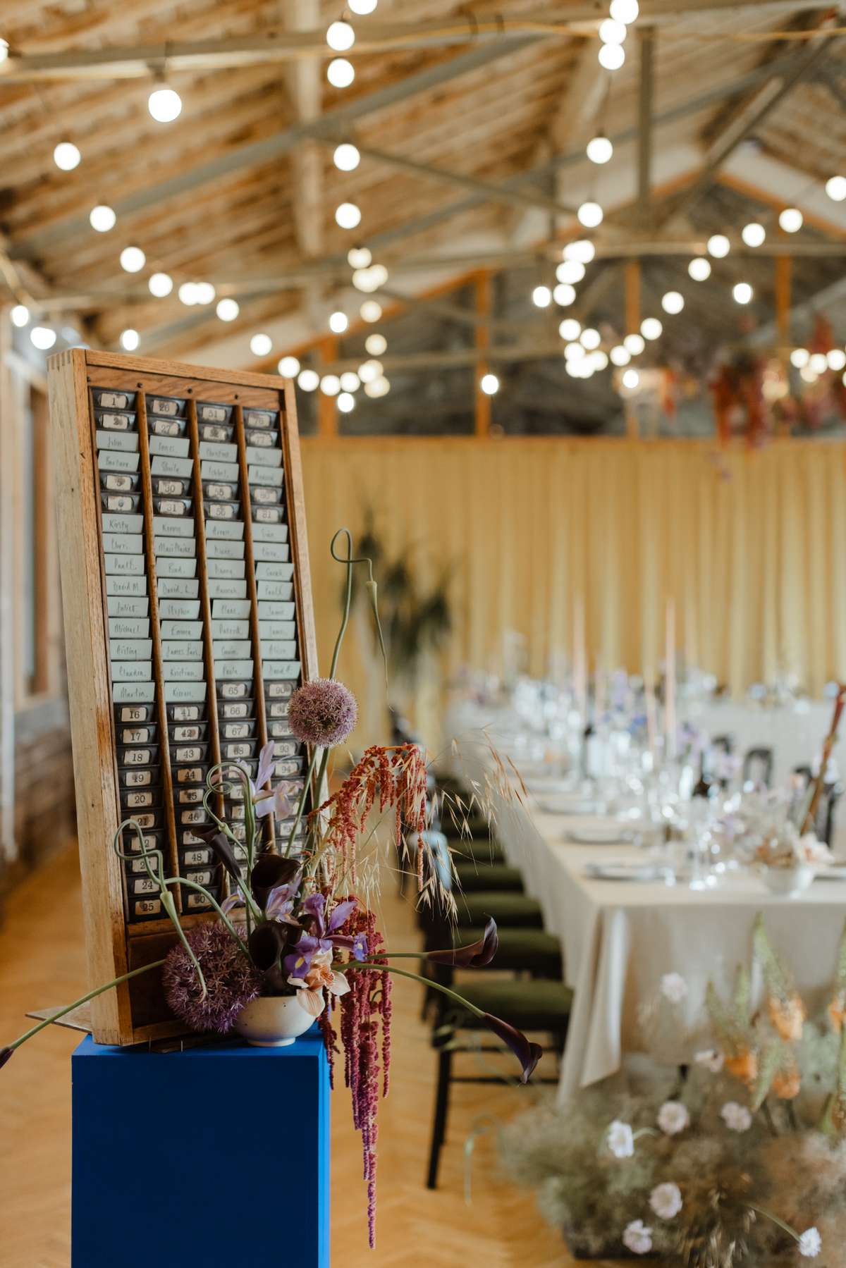Colourful floral wedding decor and seating plan at Civic House Glasgow