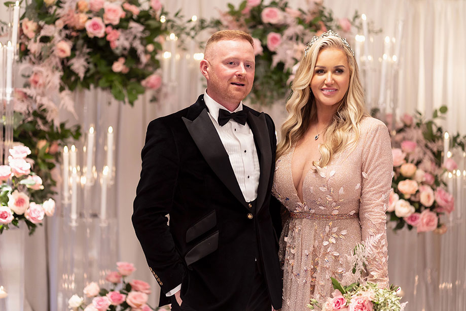 bride and groom posing at Torrance Hotel wedding