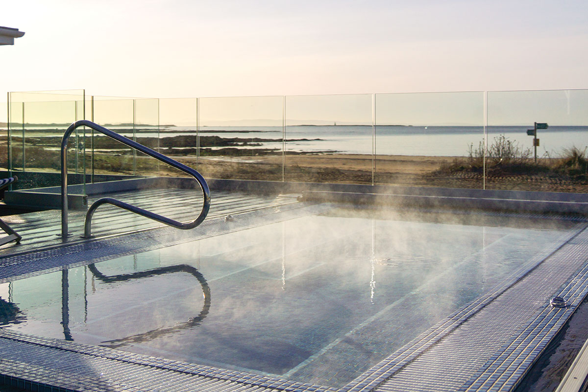 Outdoor hydro pool at Si! Spa at The Waterside Hotel, Ayrshire, overlooking the coast