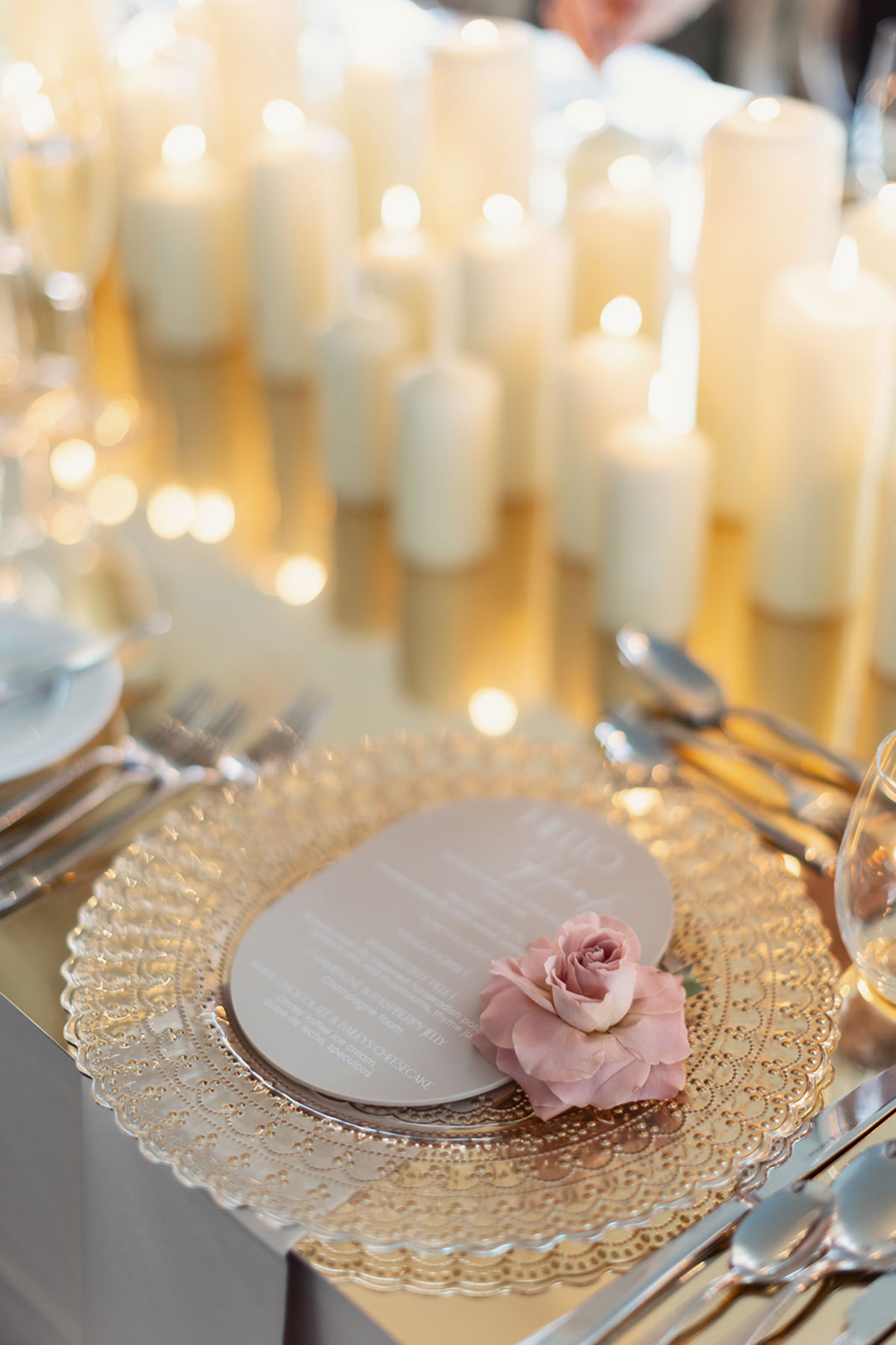 Gold charger plate with oval wedding menu and blush rose place setting detail for Old Course Hotel wedding reception in St Andrews