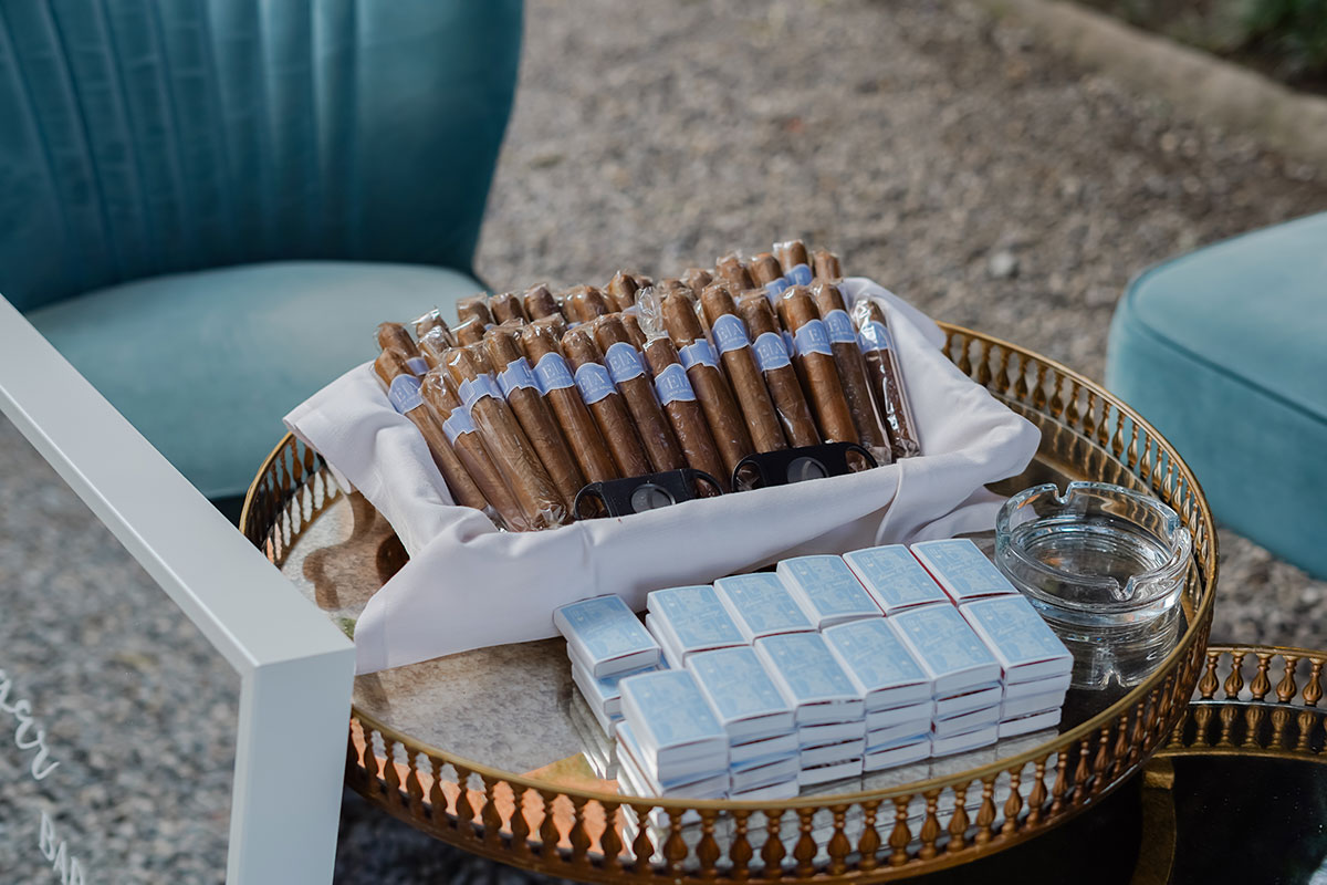 Wedding cigar bar with cigars, matches and glass ashtray at a Lake Como wedding reception.