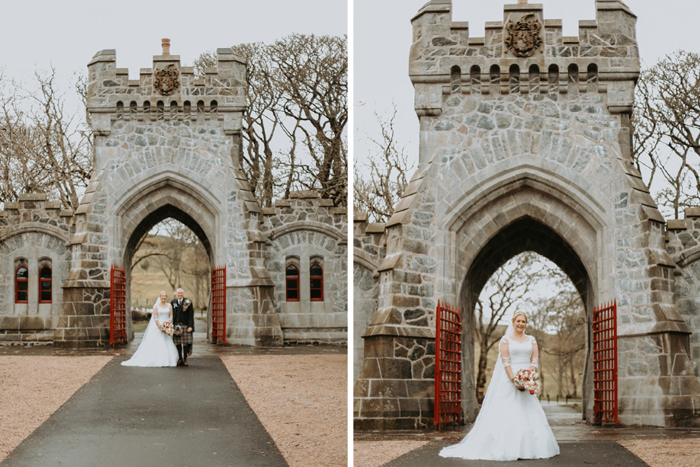 Couple portraits under castle archway with red gate