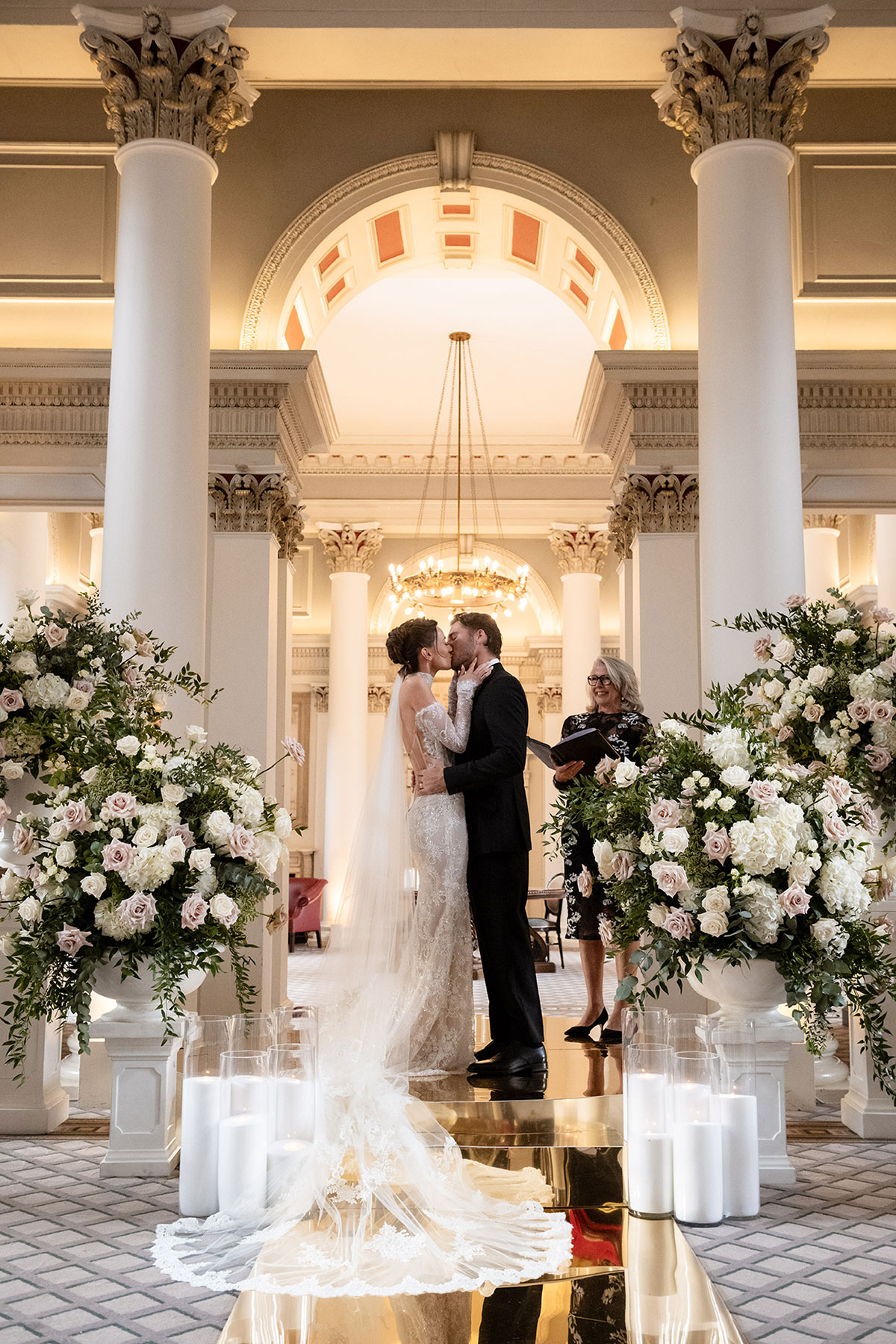 Wedding ceremony at The Signet Library Edinburgh with guests seated in The Lower Library