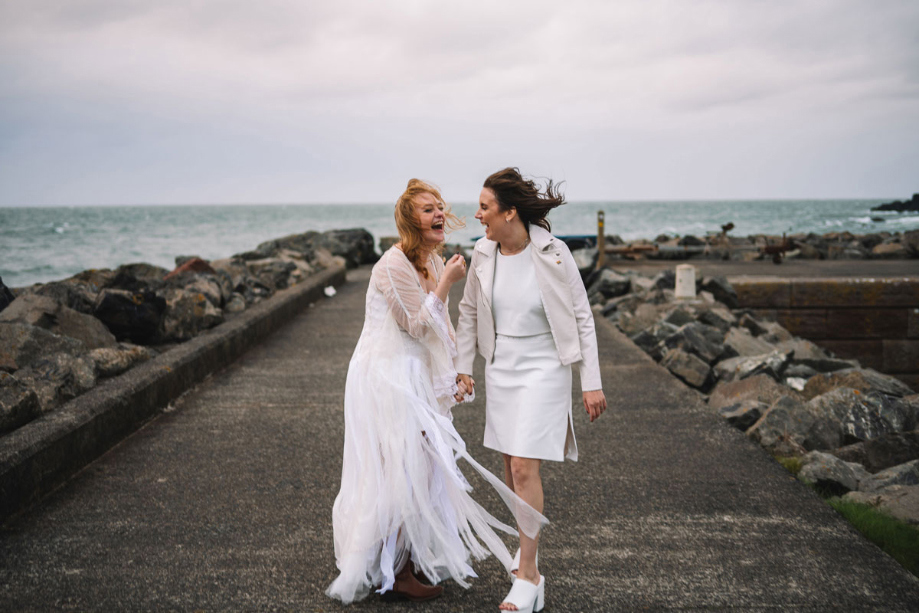 Two Brides Walking On Portpatrick Pier