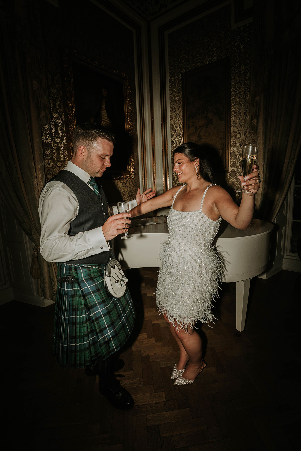 Bride in Nadine Merabi second dress dancing with groom at Drumtochty Castle Aberdeenshire evening reception