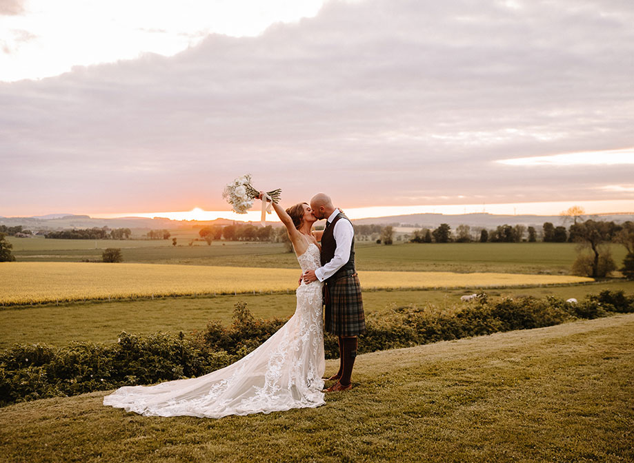 Polished luxury barn wedding with large guest list at Barn Barra Castle