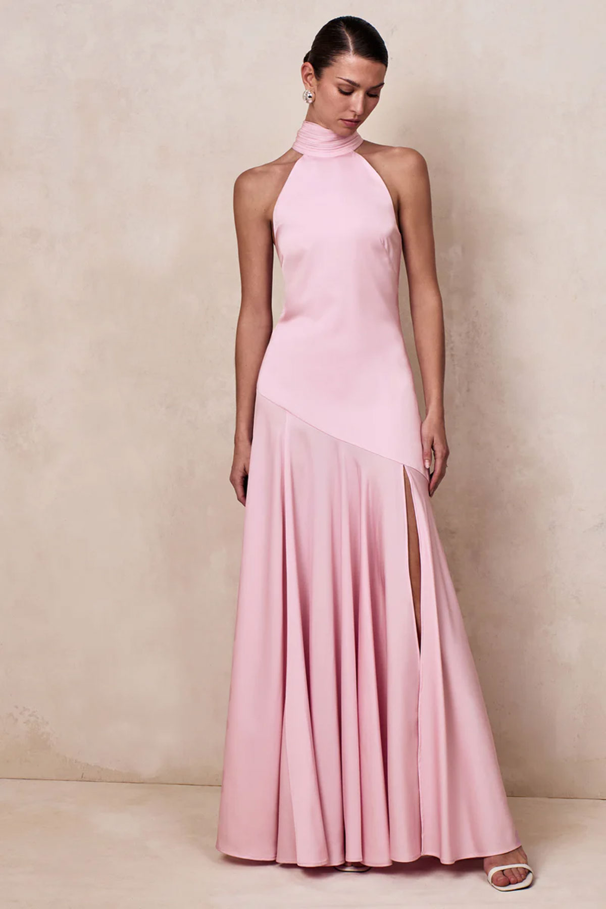 Light pink high-neck maxi dress with drop waist, soft draping and bow detail
