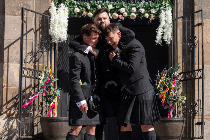 Groom With Two Male Guests Wearing Kilts Outside St Lukes