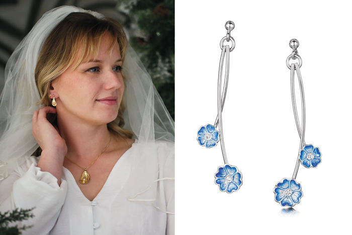Bride wearing jewellery from Sheila Fleet and a pair of silver earrings with blue flowers