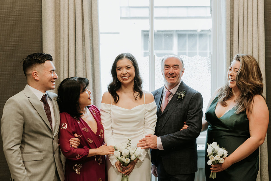 Bride with family and bridesmaid
