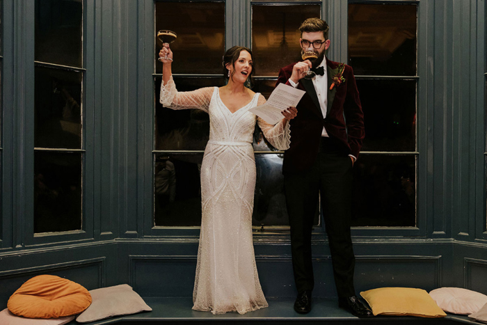 Bride And Groom Making A Toast With Espresso Martinis
