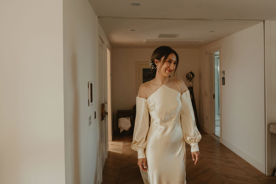 A Bride Wearing A Dress By The Own Studio